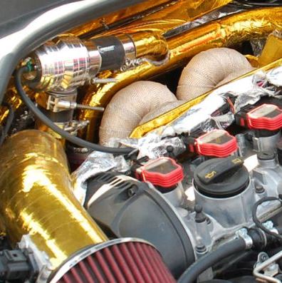 motorruimte voorzien van goud kleurige hittebestendige tape